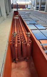 Spiral evaporter for ice plant